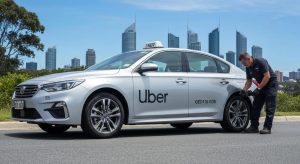 Uber vehicle inspection on the Gold Coast with a mechanic checking brakes and tyres